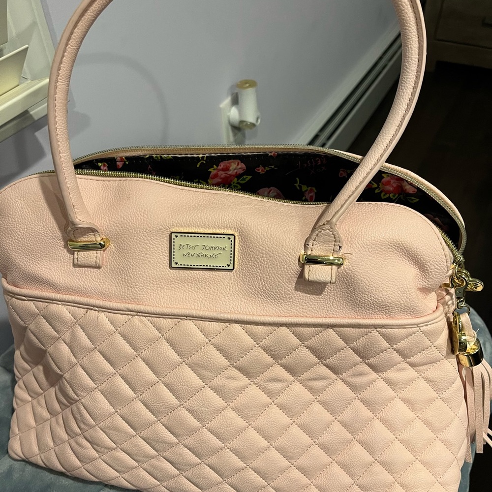 Used but in good condition Betsy Johnson light pink bag and matching wristlet